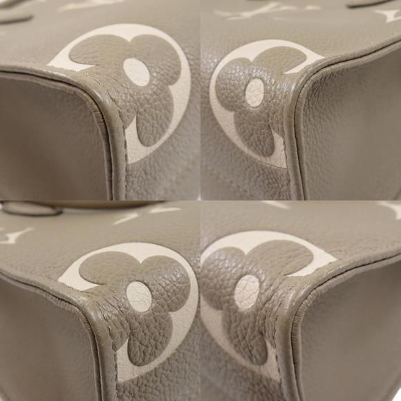 Louis Vuitton On the Go PM Bicolor Tourtrail Crème Handbag Empreinte - Picture 9 of 10